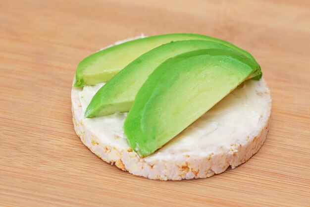 Rice cake sandwich with fresh avocado and cream cheese