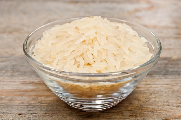 rice cereal in a glass plate on wooden table