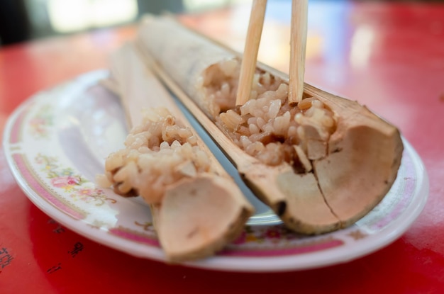 Rice cooked in bamboo tubes