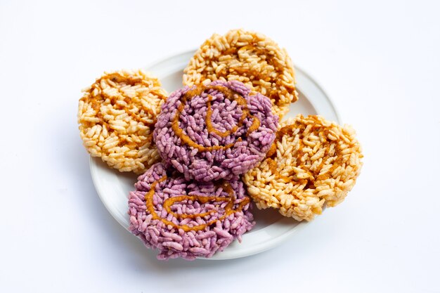 Rice cracker with coconut palm sugar on white