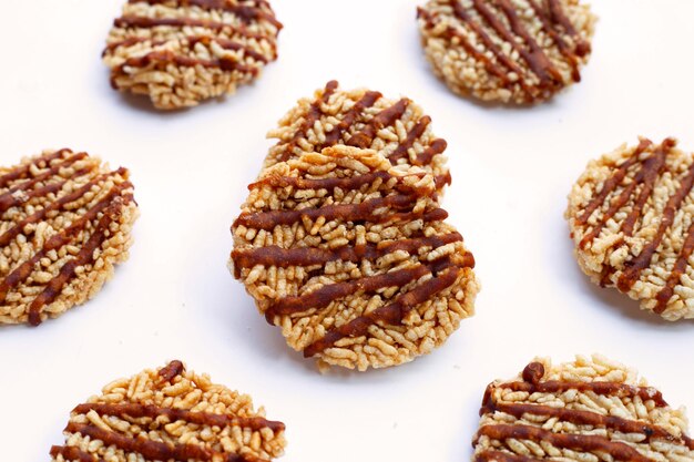 Rice cracker with coconut palm sugar on white