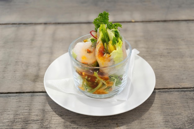 rice paper roll cuisine with grey wooden background