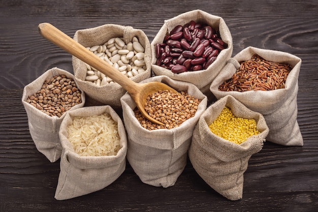 Rice, peas, beans and cereals in bags. Closeup