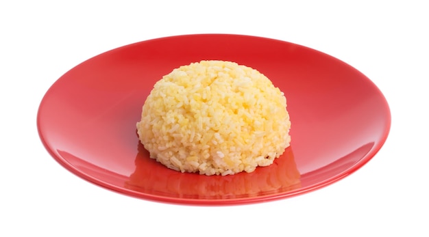 rice in a plate / a portion of cooked yellow rice in red ceramic dish