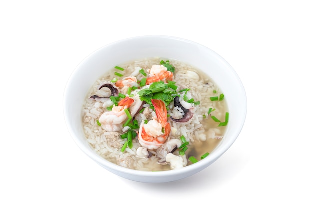 Rice porridge with  seafood isolated on white