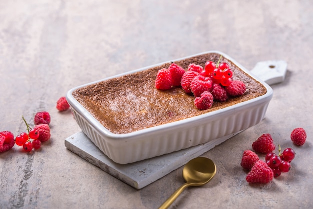 Rice pudding dessert with raspberries