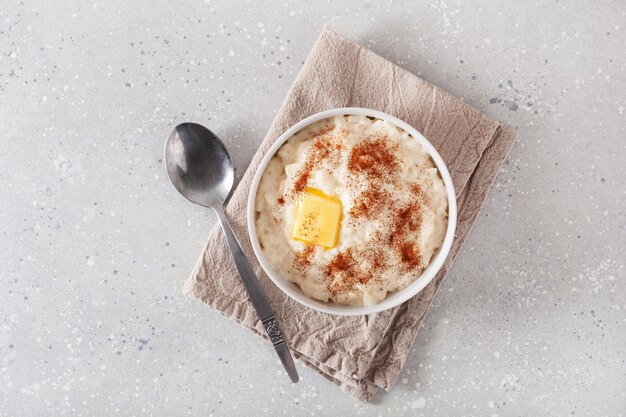 Rice pudding with butter cinnamon french riz au lait norwegian risgrot traditional breakfast dessert