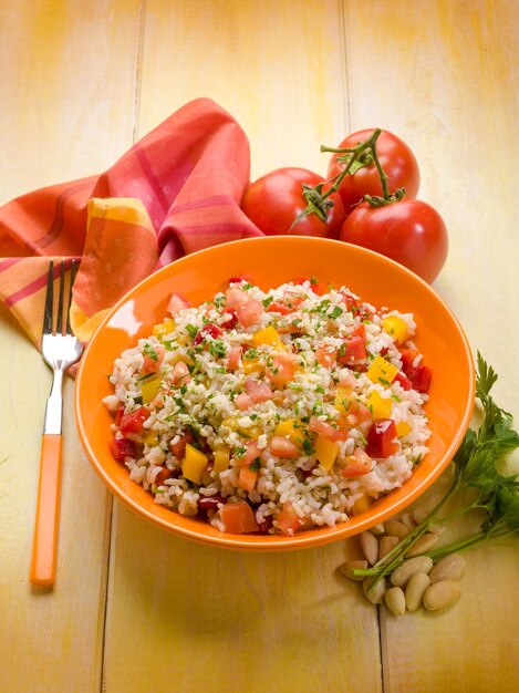 Rice salad with tomatoes capsicum and almond