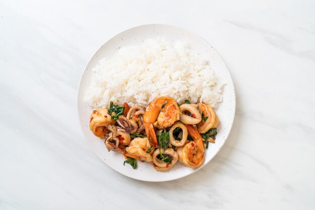 rice and stir-fried seafood with Thai basil