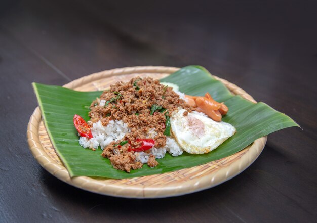 Rice topped with stir-fried pork and basil