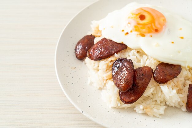 rice with fried egg and Chinese sausage - Homemade food in Asian style