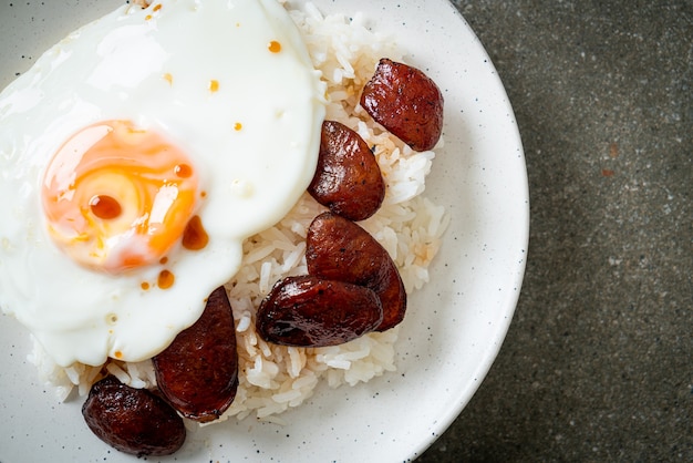 rice with fried egg and Chinese sausage - Homemade food in Asian style