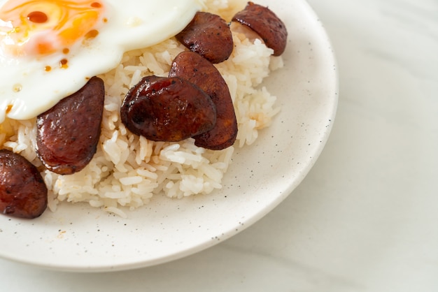 rice with fried egg and Chinese sausage - Homemade food in Asian style