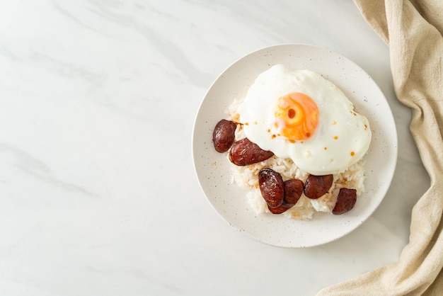 rice with fried egg and Chinese sausage - Homemade food in Asian style