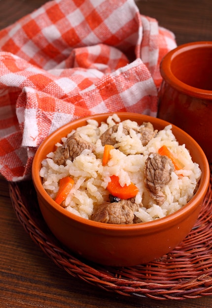 Rice with meat and vegetables in pottery