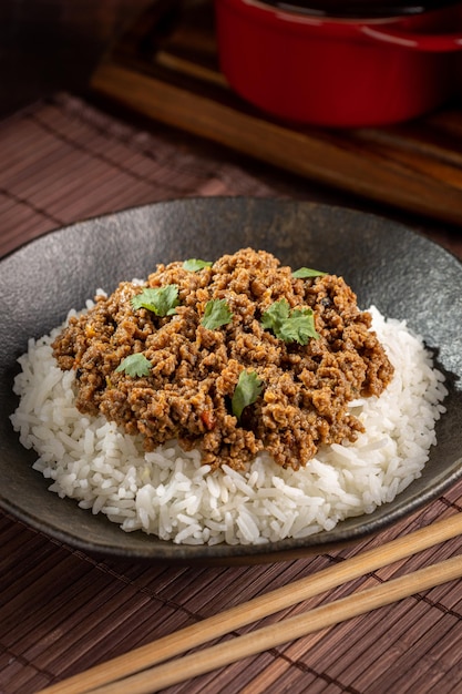 Rice with minced meat on the plate