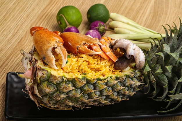 Rice with seafood in pineapple