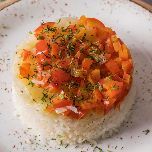 Rice with vegetables on a plate.