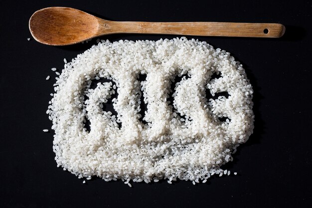 rice with wooden spoon