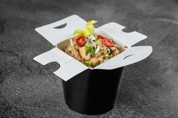 Rice in wok box for food delivery