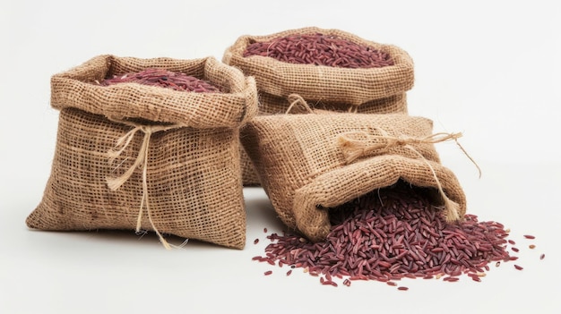 Riceberry rice in sacks on a white background