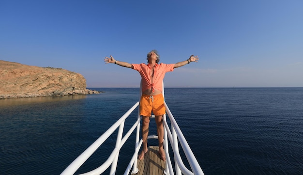 rich businessman resting on a yacht