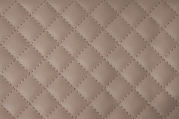 Photo rich luxury leather background in rhombus. rhomboid leather texture.