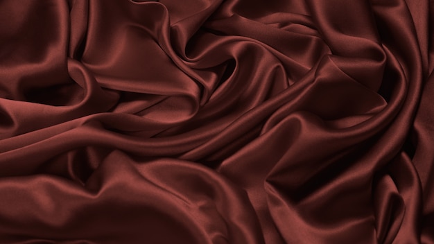 Photo rich and luxury red silk fabric texture background. top view.