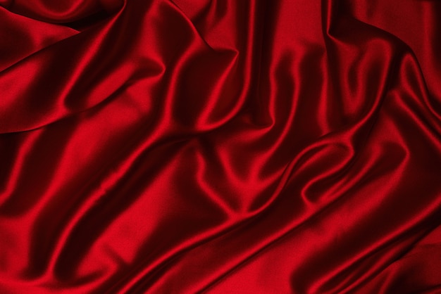 Rich and luxury red silk fabric texture surface. Top view.