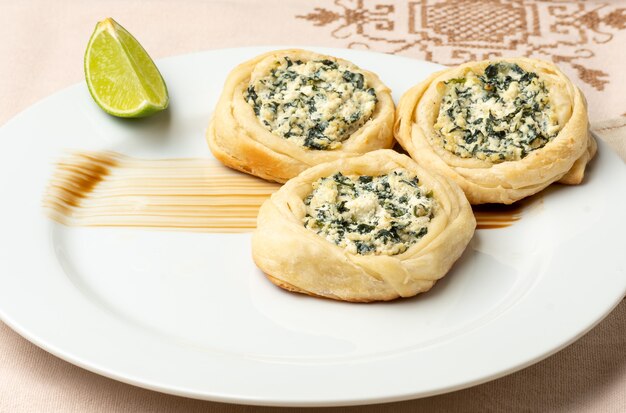 Ricotta cheese puff pastry sfiha with spinach