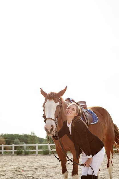 Rider elegant woman riding her horse outside