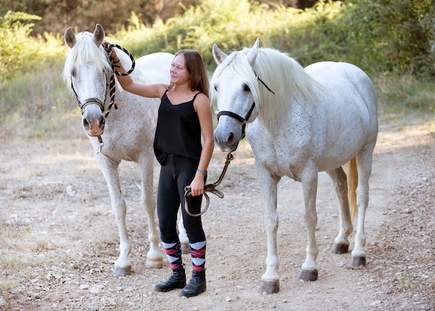 Riding girl and horse