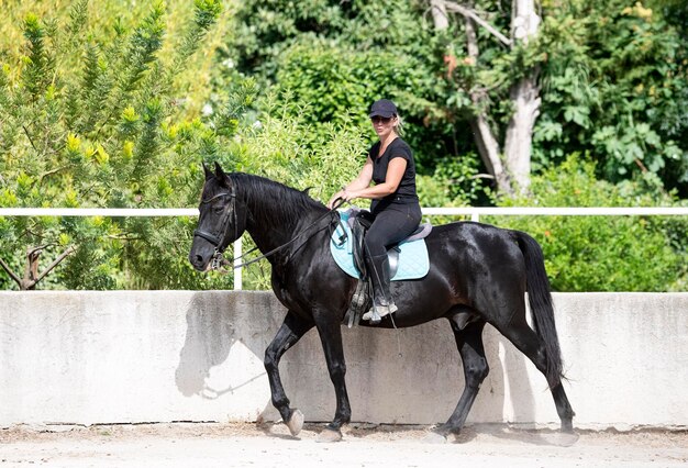 Riding girl and horse