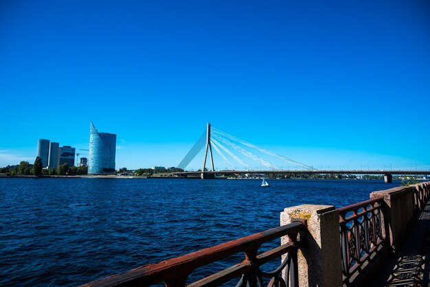 Riga latvia - 09102022 cable-stayed bridge in riga across the daugava river view from embankment