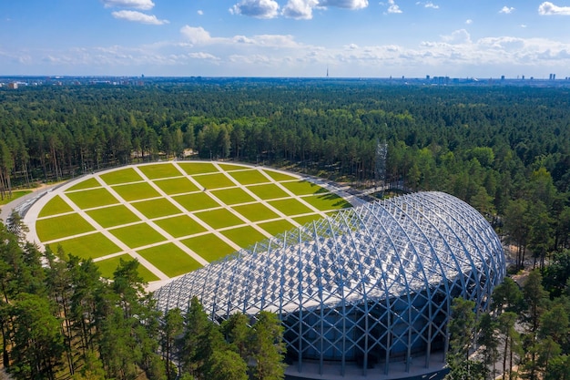 Riga, Latvia. August 10, 2020. Beautiful new stadium located in the middle of a forest. Aerial view of the Great Bandstand in Mezaparks in Riga, Latvia.