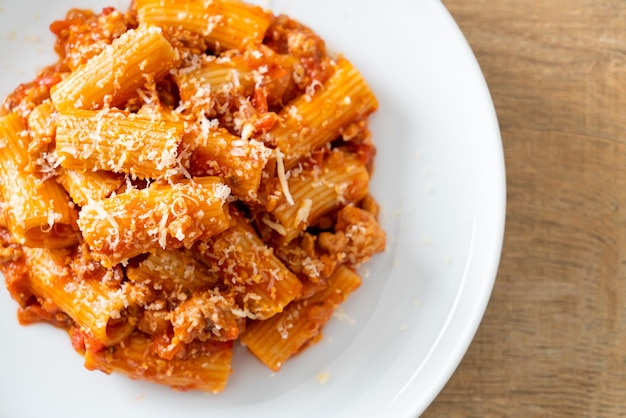 Rigatoni pasta bolognese with cheese