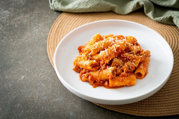 Rigatoni pasta bolognese with cheese