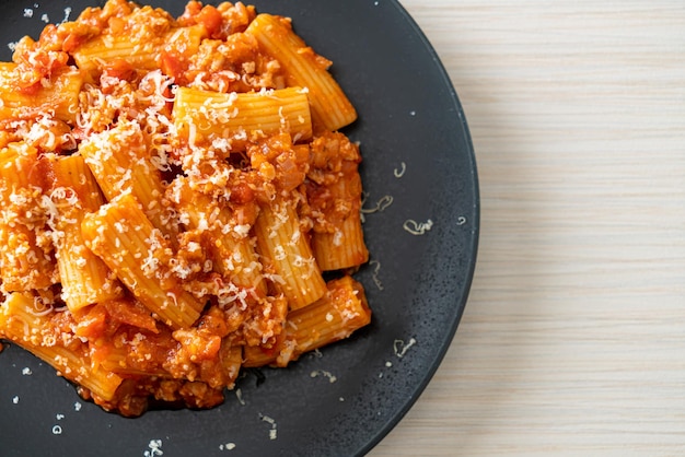 Rigatoni pasta bolognese with cheese