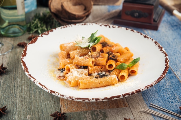 Rigatoni pasta putanesca with olives anchovies