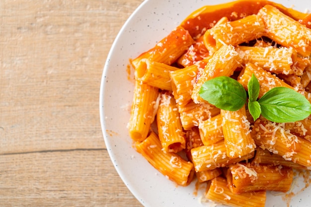 Rigatoni pasta with tomato sauce and cheese traditional Italian pasta