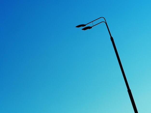 Right aligned street lamp during daylight backdrop