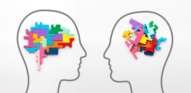 Photo right and left sides of the brain concept puzzle pieces in the shape of a brain