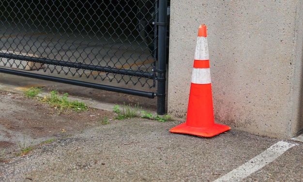 Photo right orange construction cones line the street symbolizing progress caution and temporary disrup