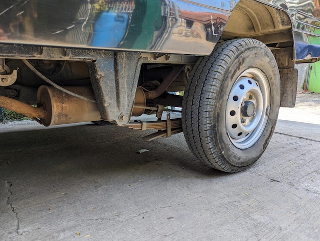 a rim and tire on the rear of the car