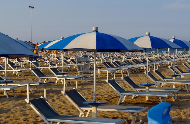 Rimini White blue umbrellas and sunbeds