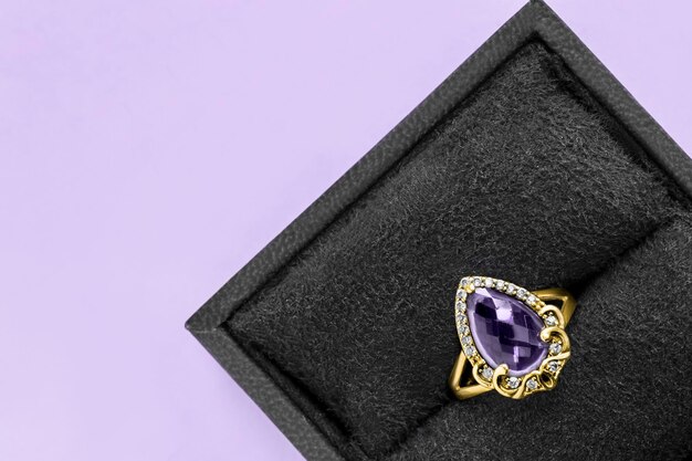 Ring in a box on lavender