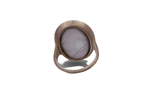 A ring with a stone in the middle that has a hole in it.