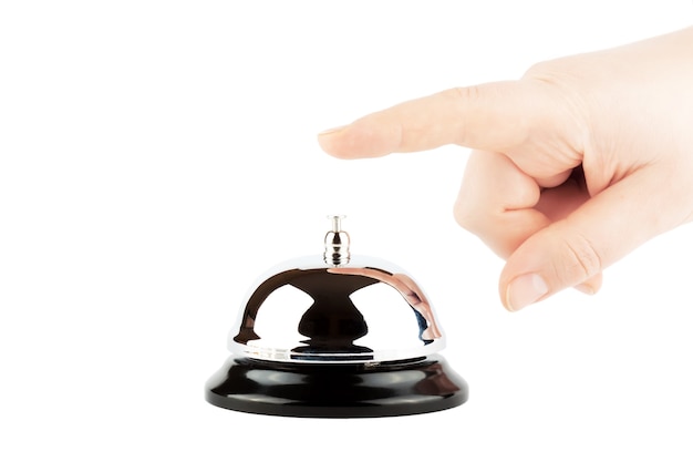 Ringing a Bell for Service with Hand on the white background