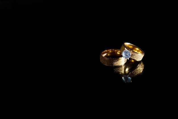 Rings on a dark background Wedding rings Jewelry