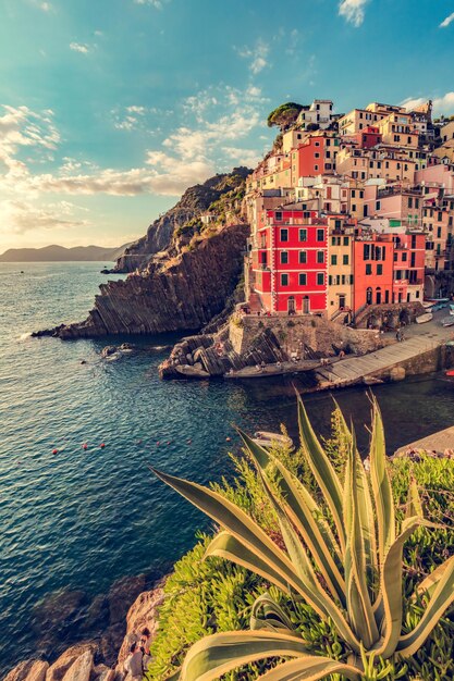 Riomaggiore in Cinque Terre Italy at sunset Popular tourist destination in Liguria coast